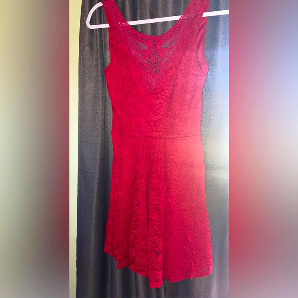 Bright Red Dress
Above the knees 
Sexy Dress, Elegant 
Fancy 
Lace patterns